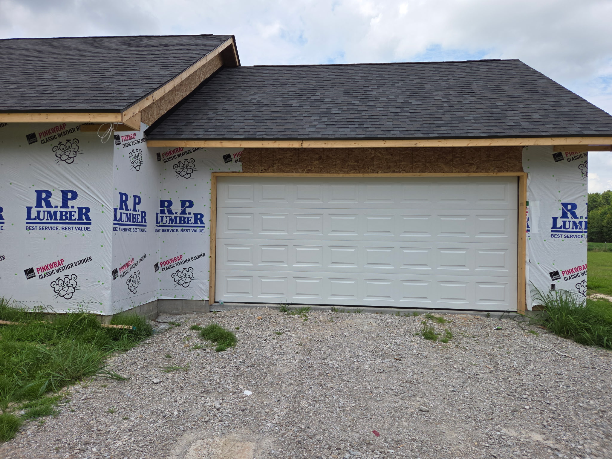 Before - garage door with wrap